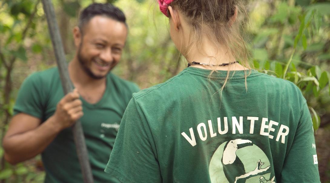 A teenager and a Projects Abroad staff member working on a reforestation initiative during Conservation volunteering in Costa Rica. A staff member and a volunteer plant seedlings on a Conservation placement in Costa Rica for teenagers.